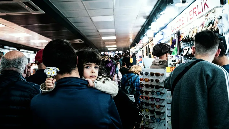 Open merchandise bins filled with Amazon returns and overstock items at a bin outlet store
