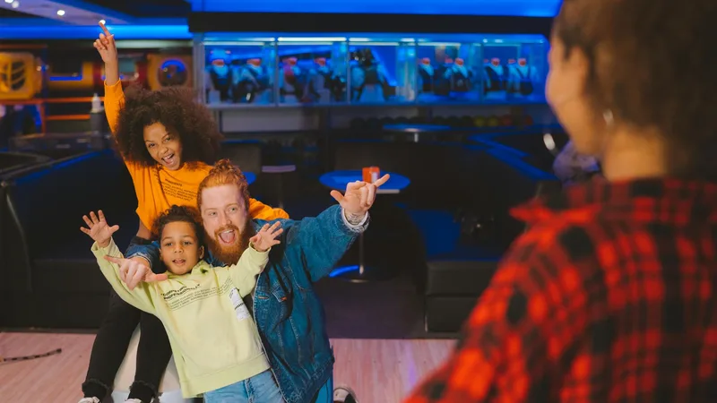 Vintage black and white photo of a historic bowling alley with wooden lanes