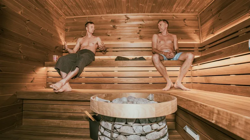 Cold plunge pool at a contrast therapy studio with warm lighting