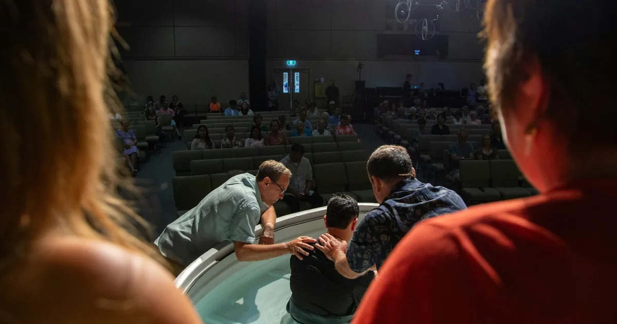 Customers enjoying the Cold Plunge Pal experience in a vibrant tub