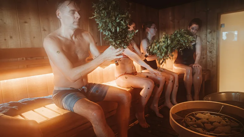 Cold plunge pool with thermometer showing 52°F at a professional cold water therapy center
