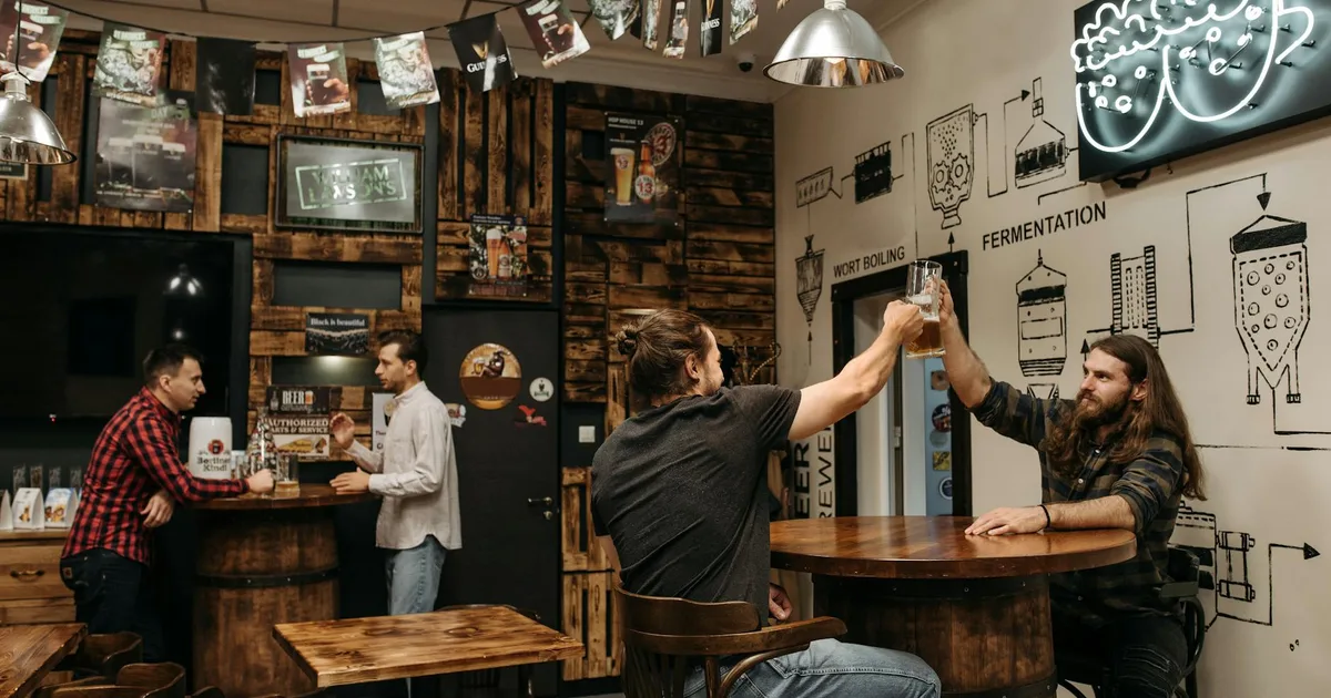 Group of friends tasting beers at a Craft Brewery Pal