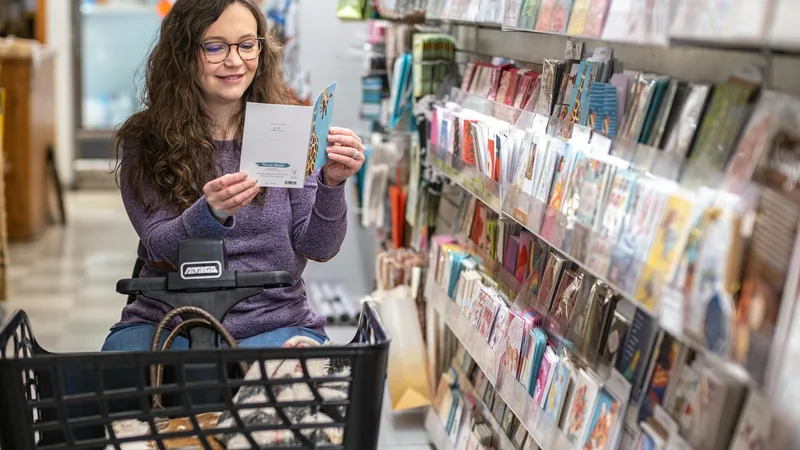 Organized dollar store shelves with cleaning supplies, party items, and pantry goods