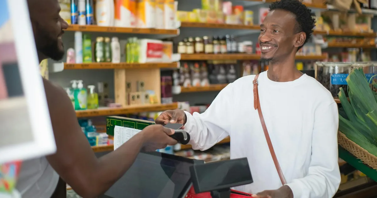 Customers engaging with products at a Liquidation Store Pal location