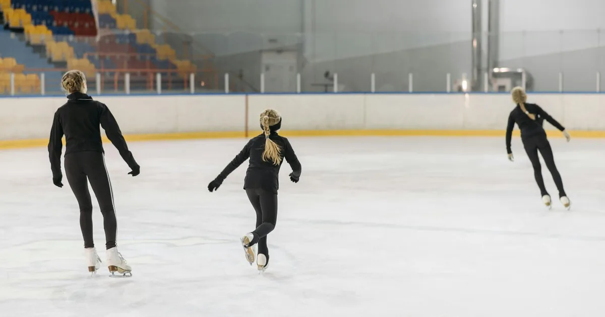 First-time skaters stepping onto an ice rink for the first time