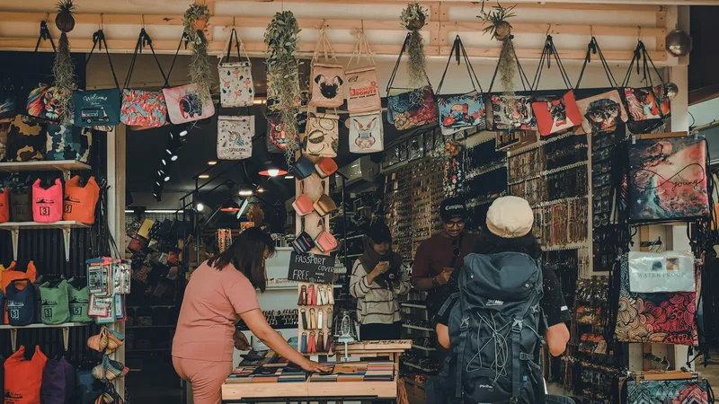 Military surplus gear including boots, clothing, and tactical equipment on store shelves