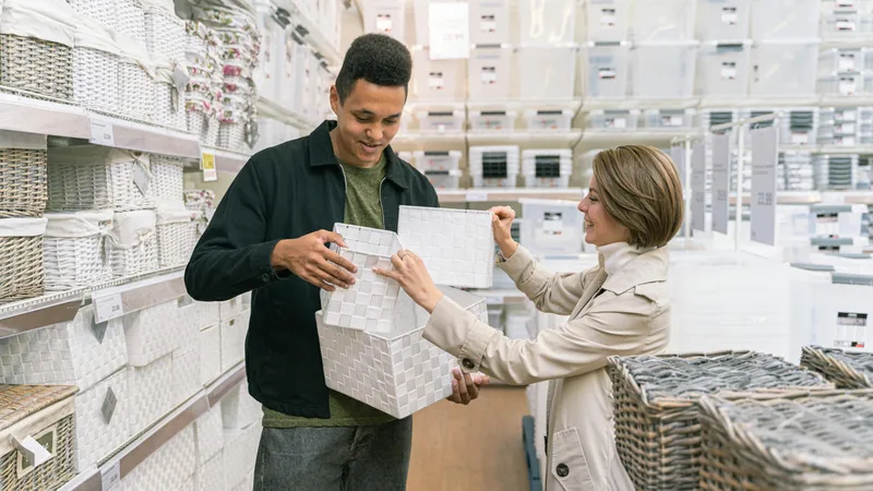 Rows of surplus merchandise including tools, outdoor gear, and boxed electronics inside a large surplus store