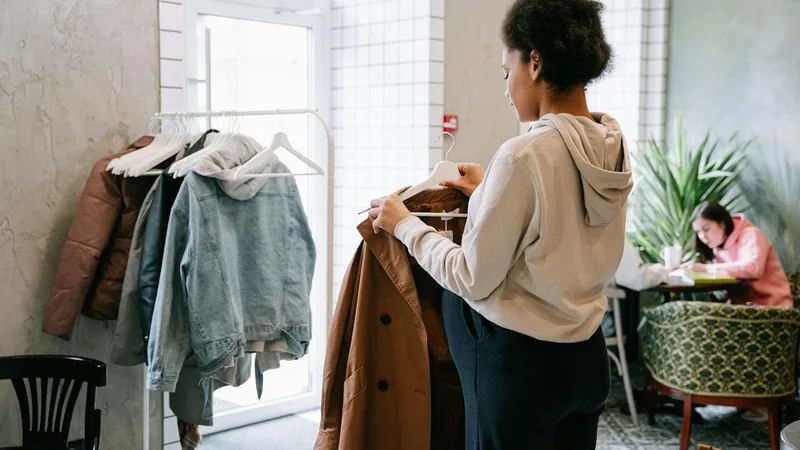 Shelves stocked with winter surplus goods including coats, tools, and holiday items at a surplus store