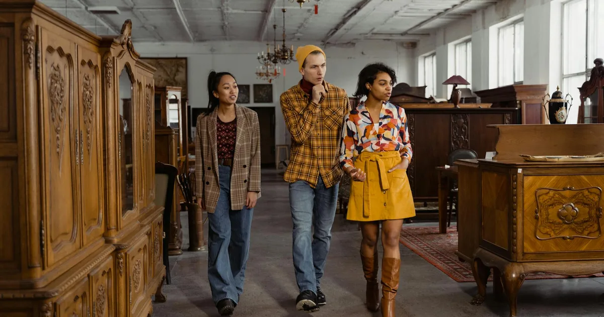 A joyful shopper finding treasures at Thrift Store Pal.