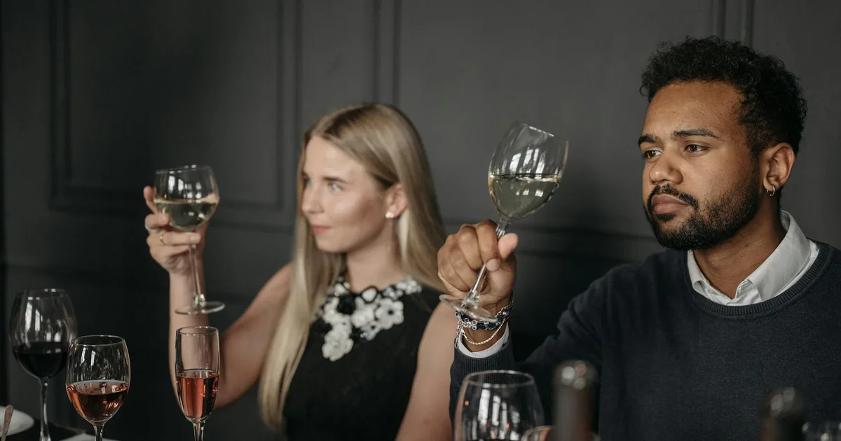 Group of friends tasting wine at Winery Pal vineyard